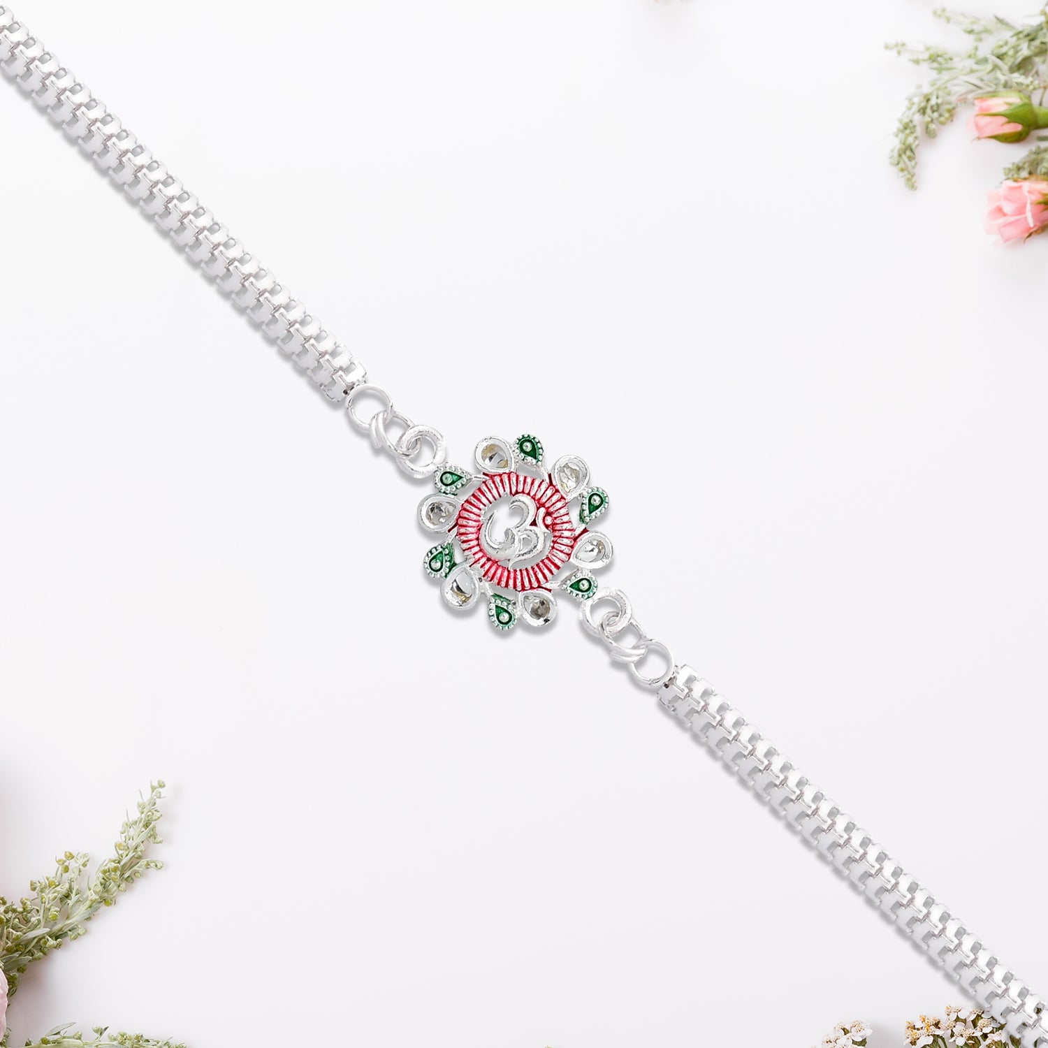 Elegant Floral Om Rakhi With Pink-green Accents