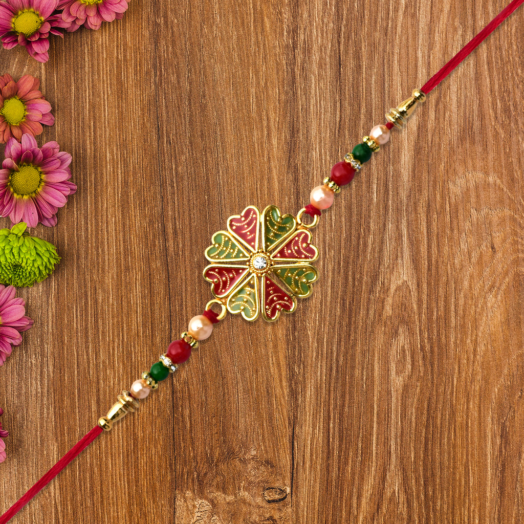 Traditional Kundan Rakhi With Golden Floral Base And Rudraksha Beads