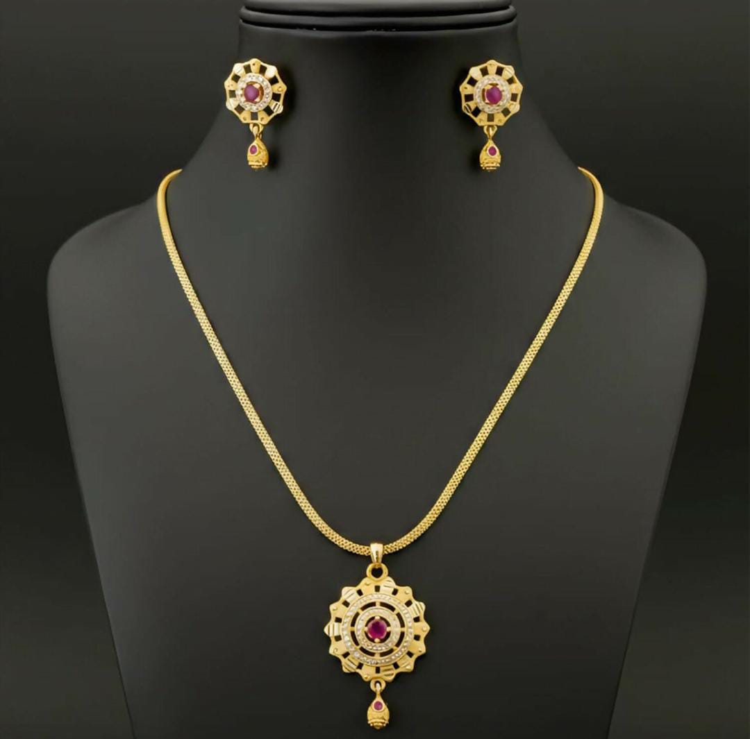 Micro gold-plated plated Ruby and White stone pendant set with matching earrings.