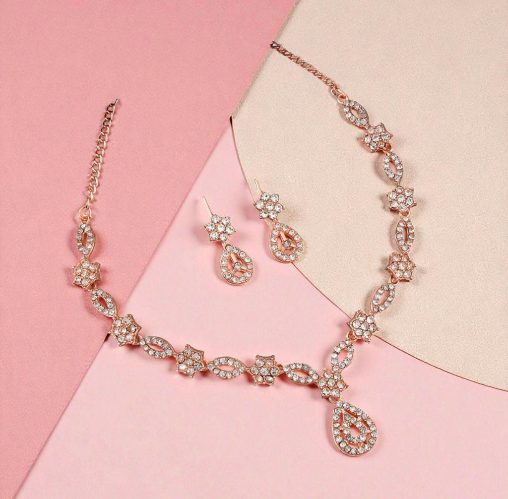 Elegant crystal and enamel floral link Necklace set with pearl drop.