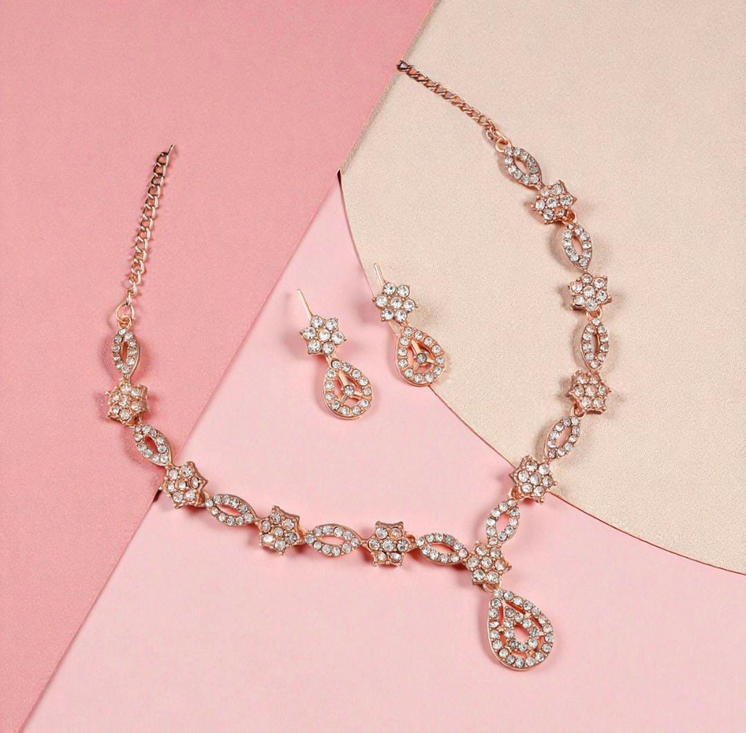 Elegant crystal and enamel floral link Necklace set with pearl drop.