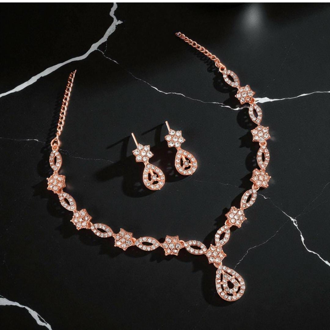 Elegant crystal and enamel floral link Necklace set with pearl drop.